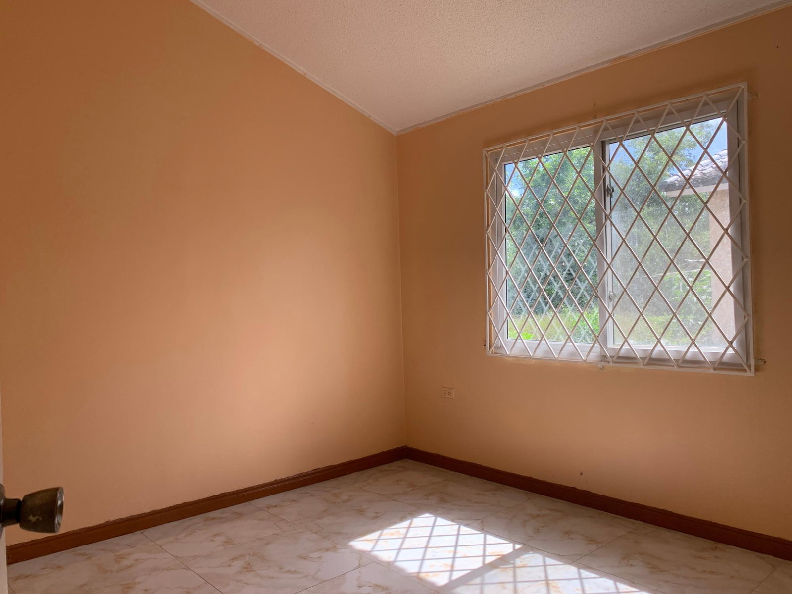 Eleventh image of 318 Carlton Cres Rosevale in SPOT VALLEY, St. James, Jamaica - property is For Rent