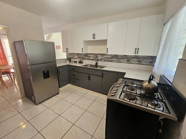 Sixteenth image of 465 Westgate Hills in Westgate Hills, St. James, Jamaica - property is For Rent