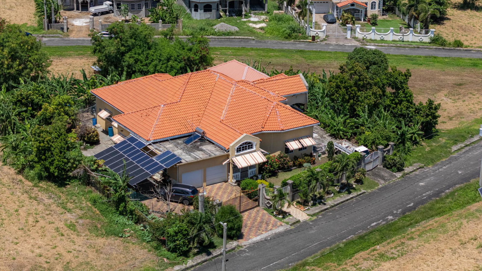 Third image of 484 Mahongany St, Pantation v in Plantation Village, St. Ann, Jamaica - property is For Sale