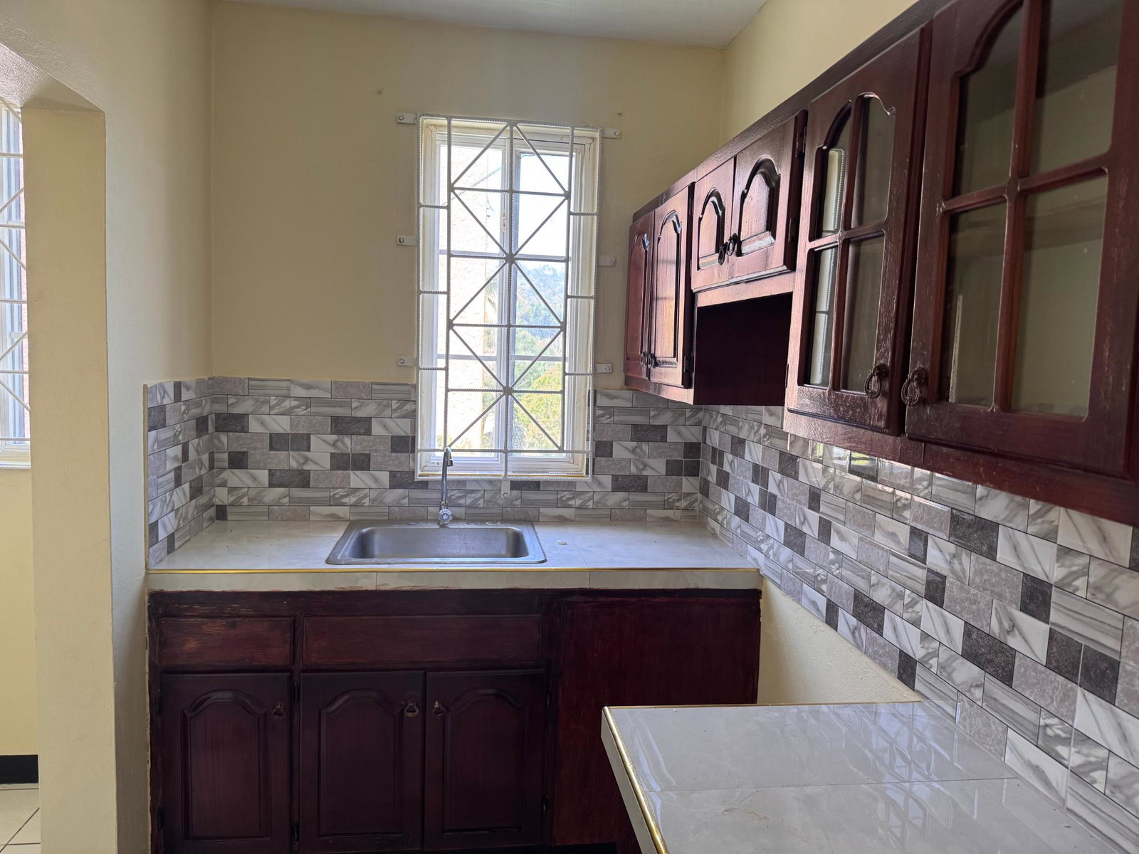 First image of 12 Hibiscus Drive, Boone Hal in Kingston 9, St. Andrew, Jamaica - property is For Rent