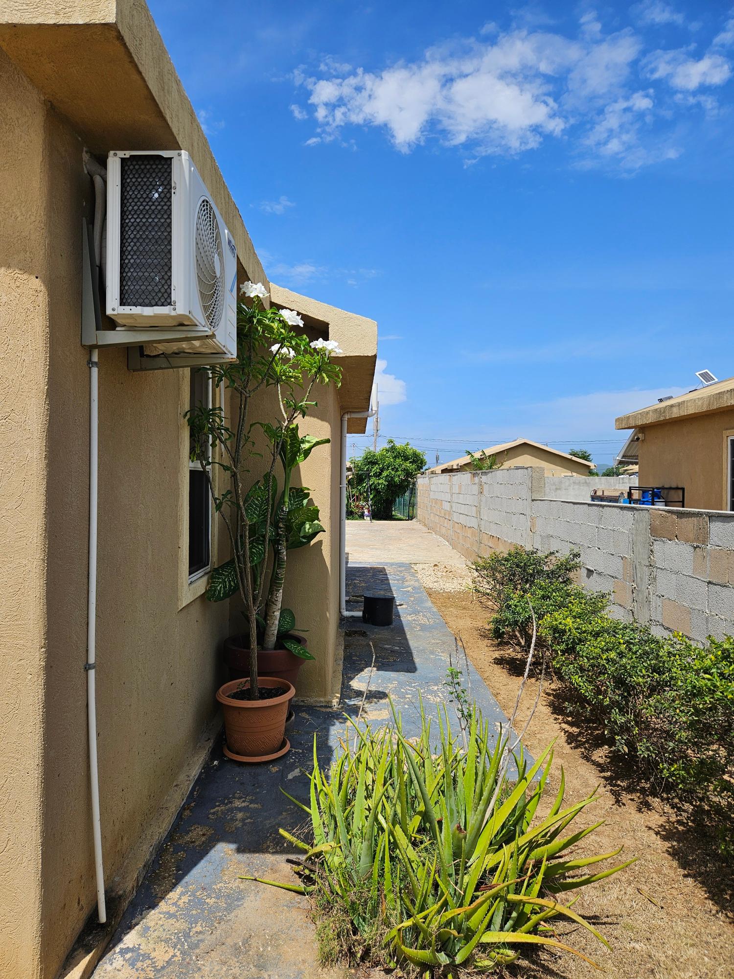 Third image of 1846 Phoenix Village 1 Phase 5 in Phoenix Park, St. Catherine, Jamaica - property is For Sale