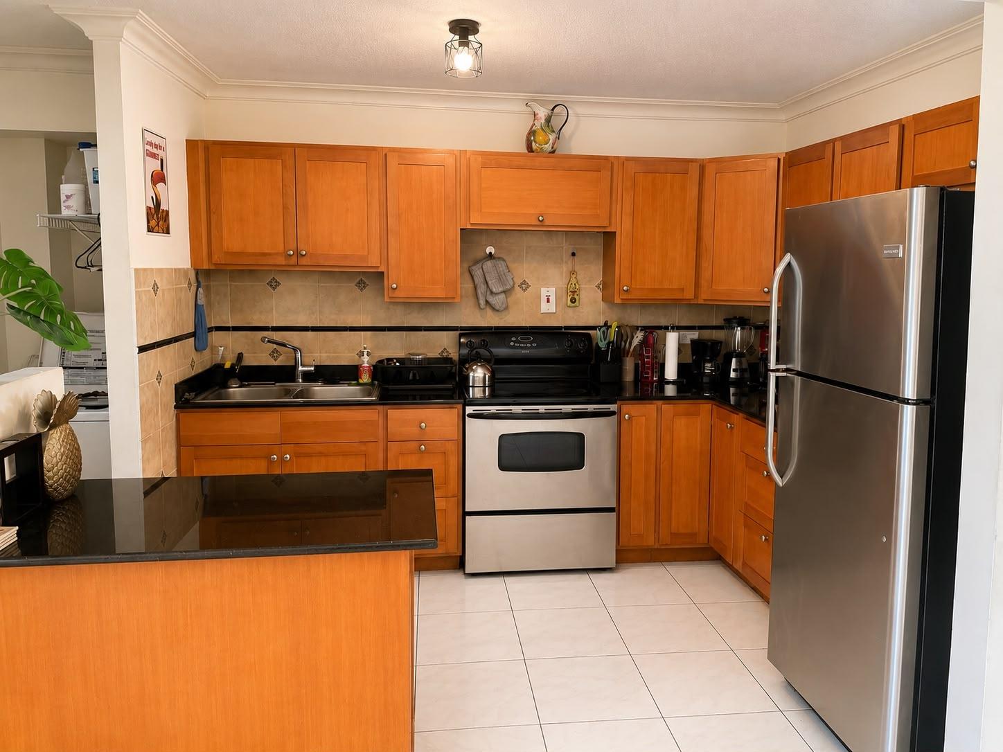 Fifth image of 13 White Cedar Road in Mango Walk C-Club, St. James, Jamaica - property is For Rent