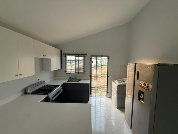 Seventh image of 399 339 Whim Pen Phase 1 in New Harbour Village, St. Catherine, Jamaica - property is For Rent