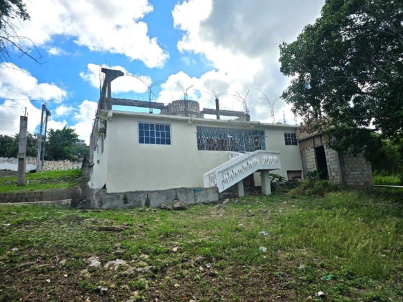 First image of Lot 140 Huddersfield in Fernandez Gardens, St. Mary, Jamaica - property is For Sale
