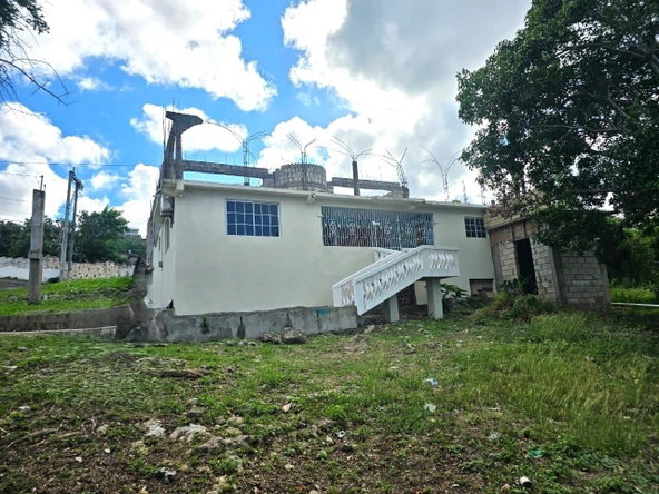 First image of Lot 140 Huddersfield in Fernandez Gardens, St. Mary, Jamaica - property is For Sale
