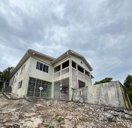 First image of 4 Woodleigh Decarteret Road in Mandeville, Manchester, Jamaica - property is For Sale