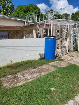 First image of 65 Kennedy Drive, Ensom City in Ensom City, St. Catherine, Jamaica - property is For Sale