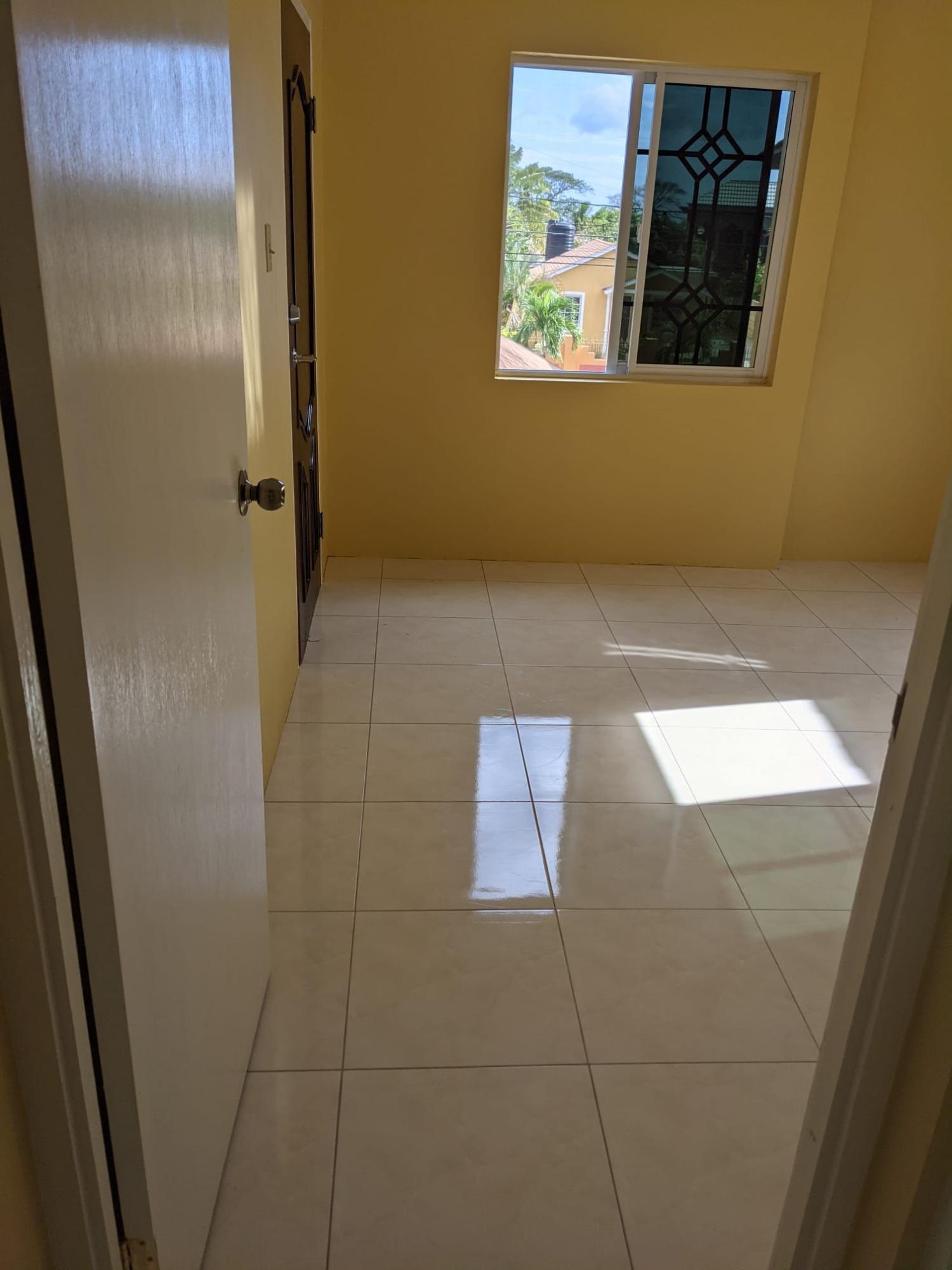 2-Bedroom-Flat-for-Rent-in-Magil-Palms-Spanish-Town Second image of Lot 448- Palm Circle in MAGIL PALMS, St. Catherine, Jamaica - property is For Rent