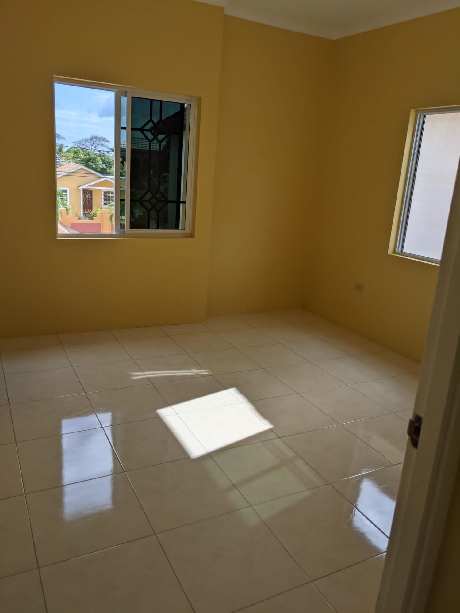 2-Bedroom-Flat-for-Rent-in-Magil-Palms-Spanish-Town Third image of Lot 448- Palm Circle in MAGIL PALMS, St. Catherine, Jamaica - property is For Rent