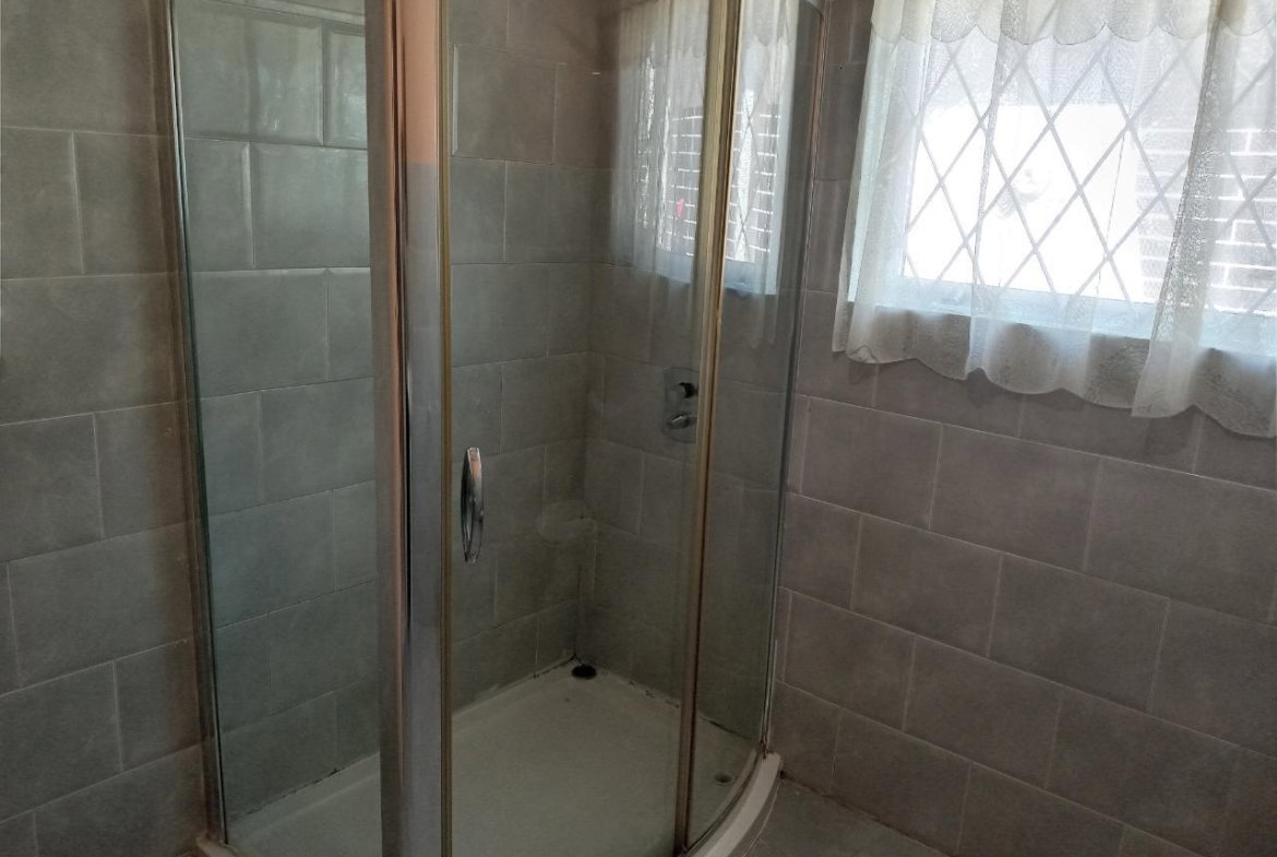 Ninth image of 3- Three Oaks Gardens in Kingston 19, St. Andrew, Jamaica - property is For Rent