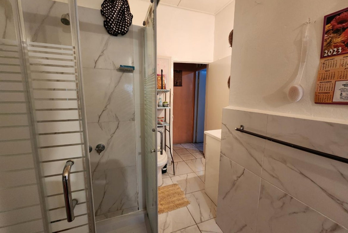 Twenty-Second image of 1 Shalimar Avenue, Kgn 3 in Vineyard Town, St. Andrew, Jamaica - property is For Sale