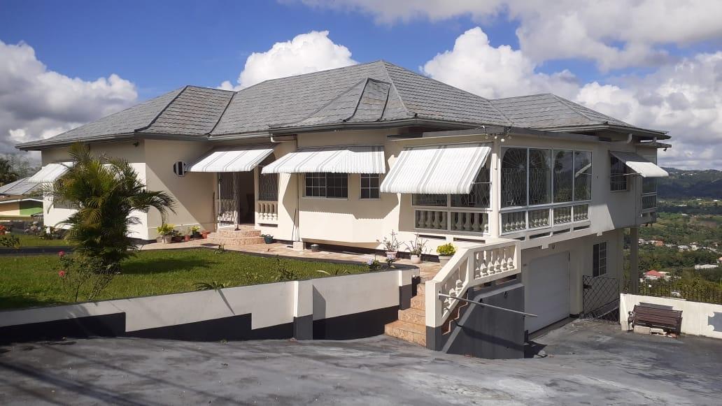 Second image of 13 Calland Heights in Sedburgh, Manchester, Jamaica - property is For Sale