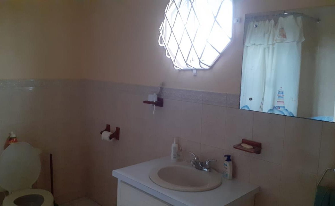 Twenty-First image of 13 Calland Heights in Sedburgh, Manchester, Jamaica - property is For Sale