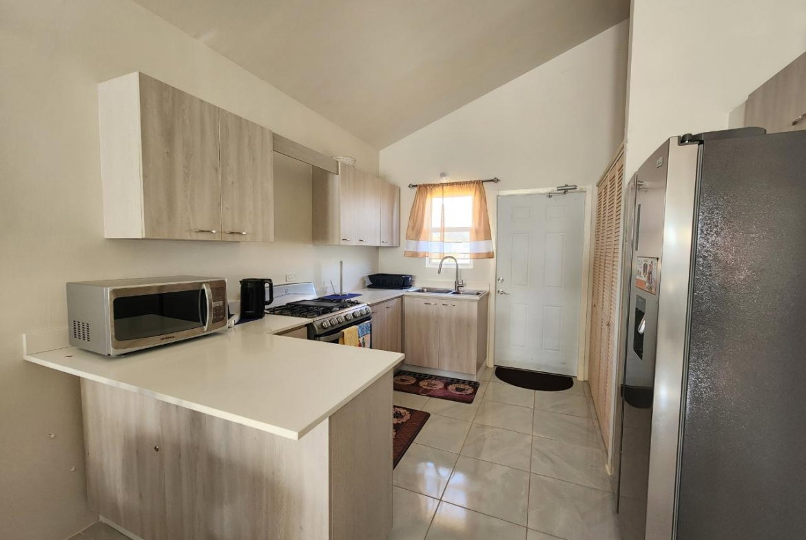 Eleventh image of 1961-11 Palmetto Drive in Phoenix Park, St. Catherine, Jamaica - property is For Rent