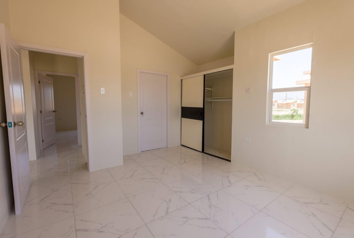 Fifth image of 704-30 Hazel Place in Phoenix Park, St. Catherine, Jamaica - property is For Rent