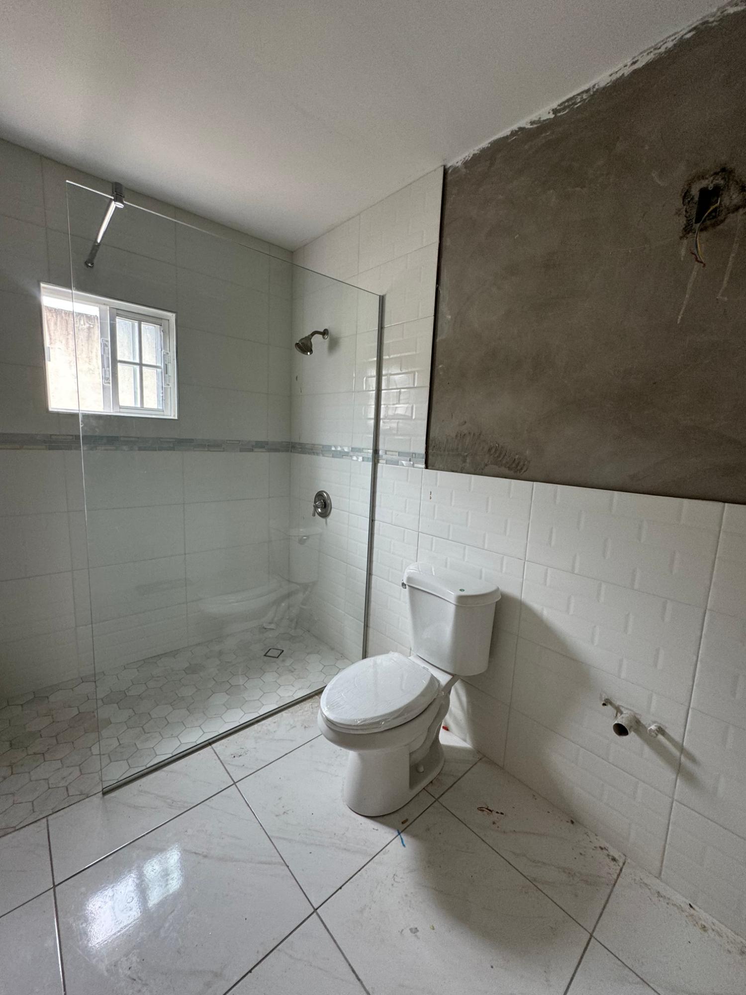 Charming-2-Bed-Apartment-for-Rent-in-Upscale-Karachi-Community Second image of 3-106 Mona/papine Estate in Kingston 6, St. Andrew, Jamaica - property is For Rent