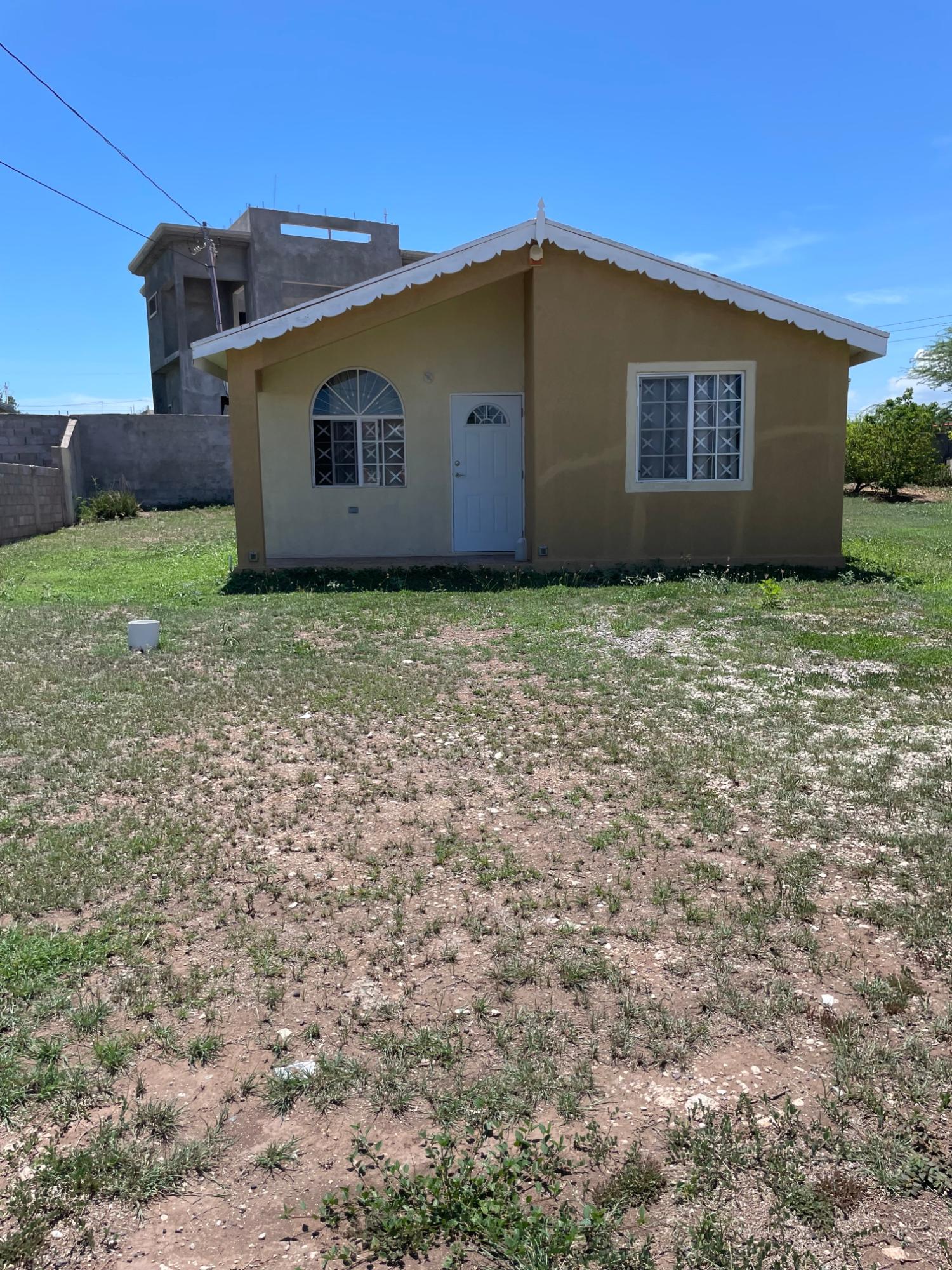Charming-2-Bedroom-Home-for-Sale-in-New-Harbour-Village-St.-Catherine First image of 243 Copper Avenue in New Harbour Village, St. Catherine, Jamaica - property is For Sale