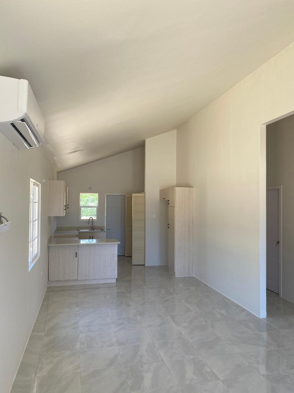 Charming-2-Bedroom-House-for-Rent-in-Gated-Community-near-Puerto-Seco-Beach-Jamaica Third image of Lot 181d Phase 4 Camelot Village in Discovery Bay, St. Ann, Jamaica - property is For Rent
