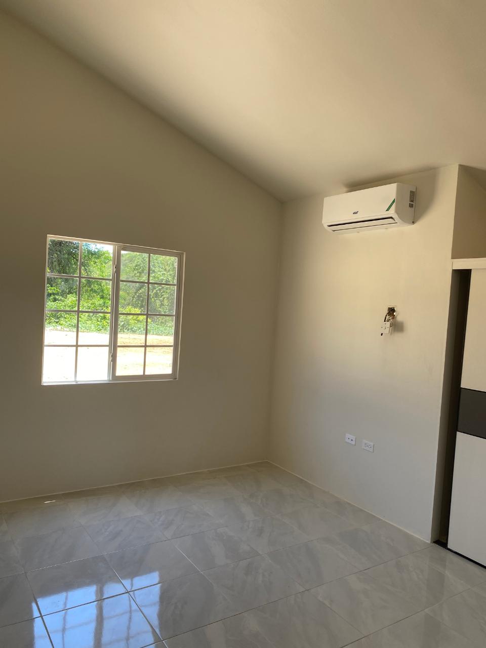 Charming-2-Bedroom-House-for-Rent-in-Gated-Community-near-Puerto-Seco-Beach-Jamaica Sixth image of Lot 181d Phase 4 Camelot Village in Discovery Bay, St. Ann, Jamaica - property is For Rent