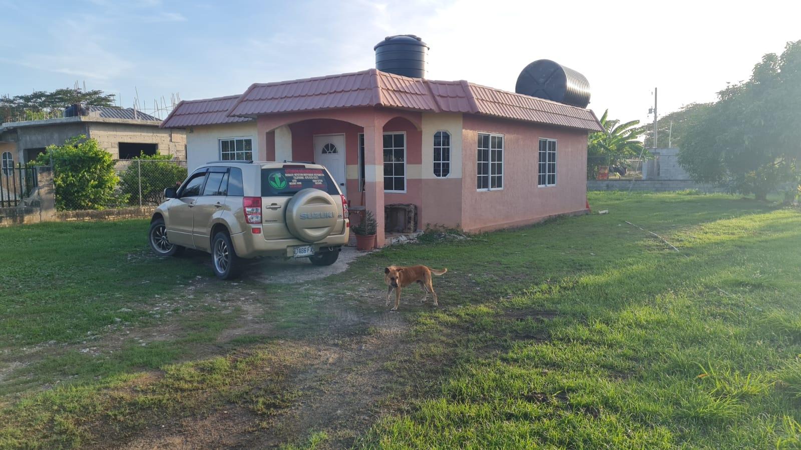 Charming-2-Bedroom-House-for-Sale-in-Casa-Buena-Estates-Westmoreland-Jamaica Second image of Lot 23 Casa Buena Estates in Farm Pen, Westmoreland, Jamaica - property is For Sale