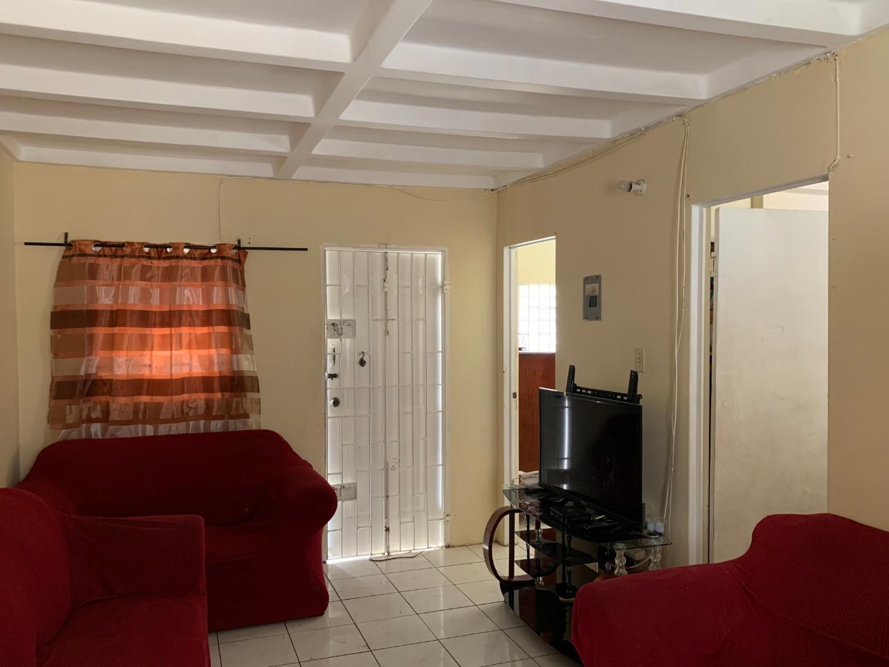 Charming-2-Bedroom-House-for-Sale-in-Greater-Portmore-Jamaica Second image of 308 ne 2nd St, 7 East in Greater Portmore, St. Catherine, Jamaica - property is For Sale