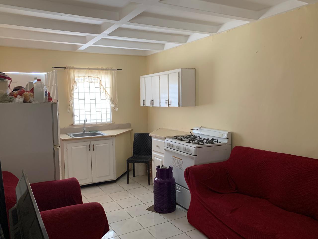 Charming-2-Bedroom-House-for-Sale-in-Greater-Portmore-Jamaica Third image of 308 ne 2nd St, 7 East in Greater Portmore, St. Catherine, Jamaica - property is For Sale