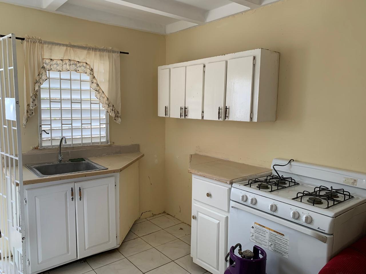 Charming-2-Bedroom-House-for-Sale-in-Greater-Portmore-Jamaica Fourth image of 308 ne 2nd St, 7 East in Greater Portmore, St. Catherine, Jamaica - property is For Sale