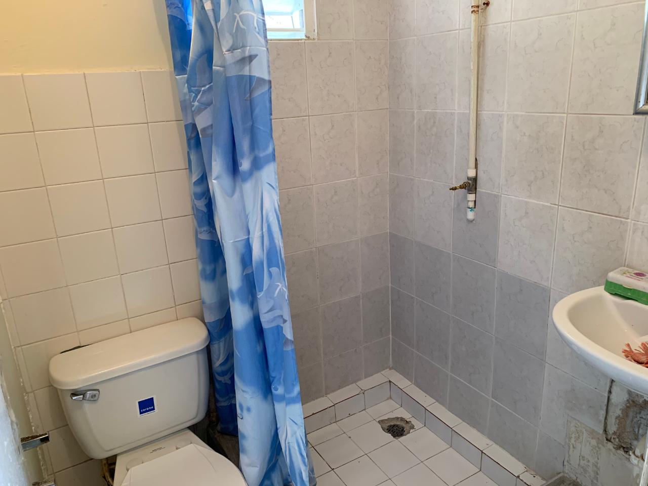 Charming-2-Bedroom-House-for-Sale-in-Greater-Portmore-Jamaica Sixth image of 308 ne 2nd St, 7 East in Greater Portmore, St. Catherine, Jamaica - property is For Sale