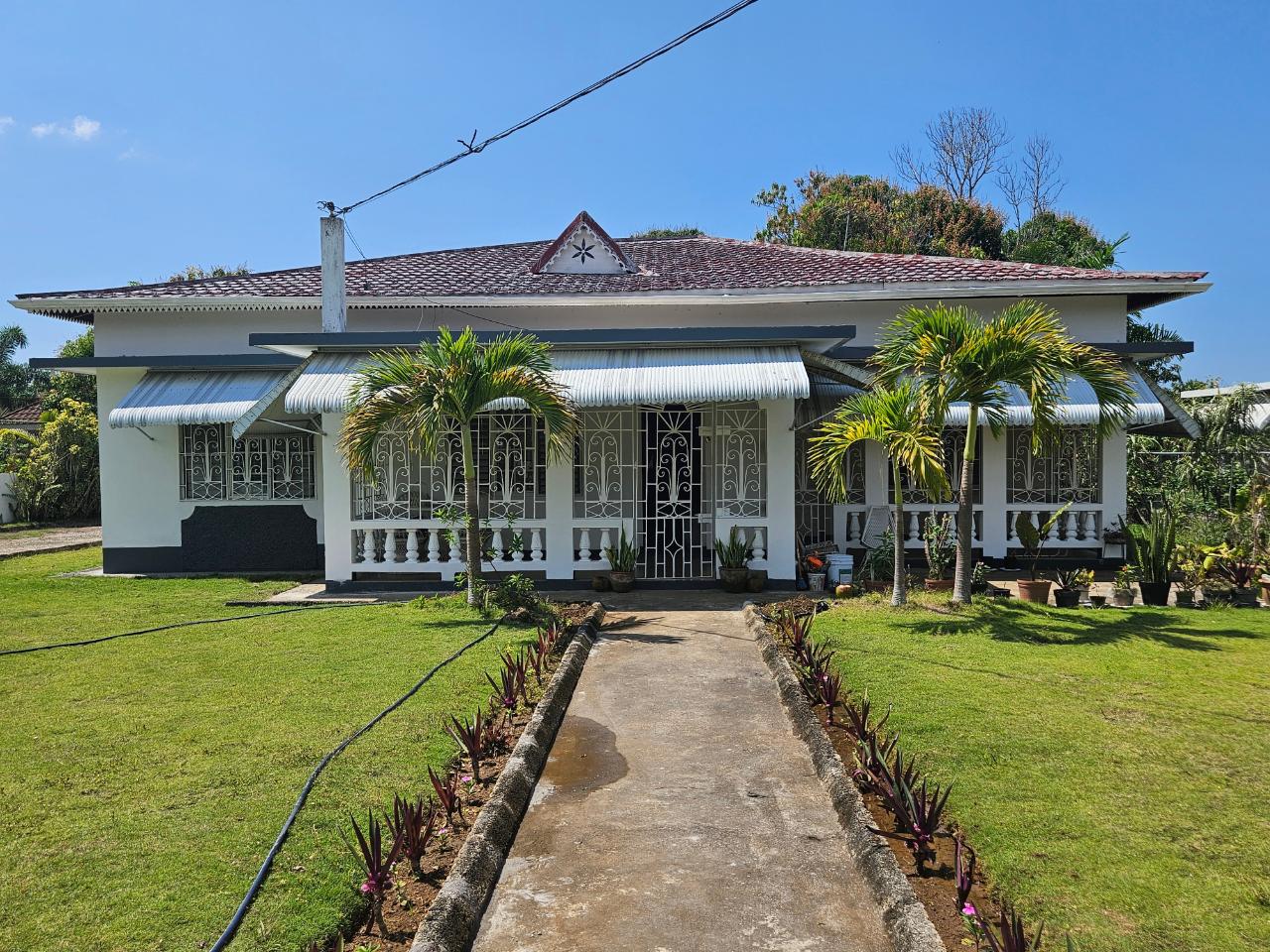 Charming-3-Bedroom-Home-for-Sale-in-Westmoreland-Parish Second image of 39 Chantilly Gardens in SAVANNA LA MAR, Westmoreland, Jamaica - property is For Sale