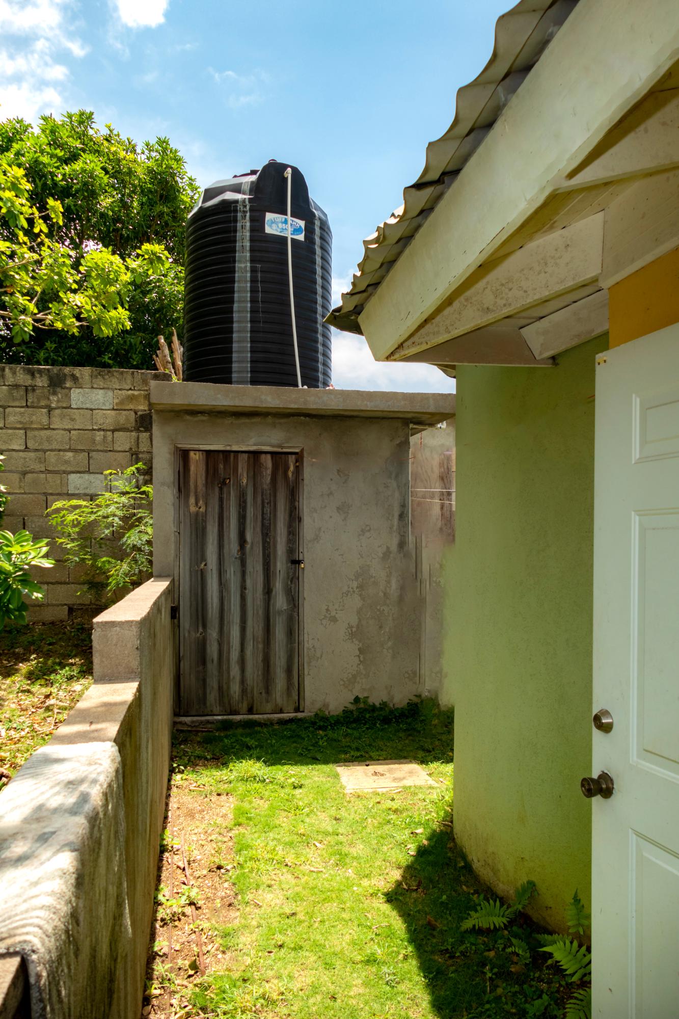 Seventh image of 149 Isaacs Close, Rosevale es in SPOT VALLEY, St. James, Jamaica - property is For Sale