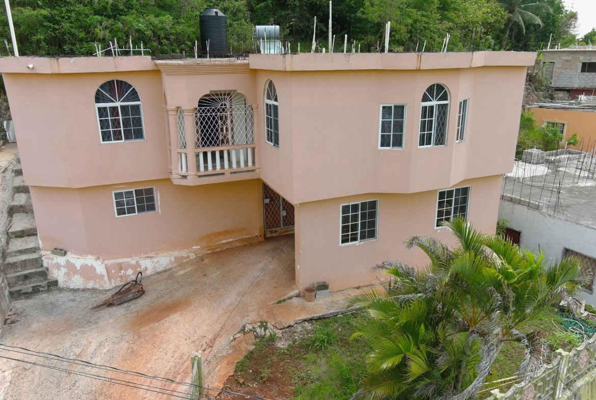 First image of 233 Ochard Circle in Mandeville, Manchester, Jamaica - property is For Sale