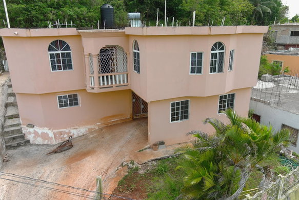 First image of 233 Ochard Circle in Mandeville, Manchester, Jamaica - property is For Sale