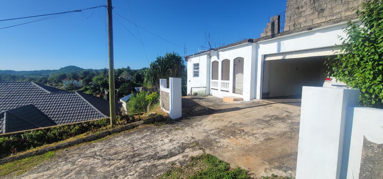 Sixth image of 223 Woodlawn Housing Scheme in Mandeville, Manchester, Jamaica - property is For Sale