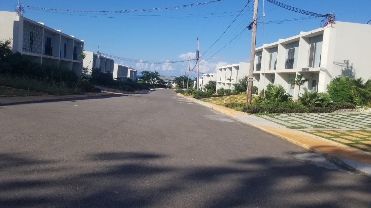 Charming-Townhouse-for-Sale-in-Camelot-Village-Jamaica Second image of 38 Camelot Village in Discovery Bay, St. Ann, Jamaica - property is For Sale