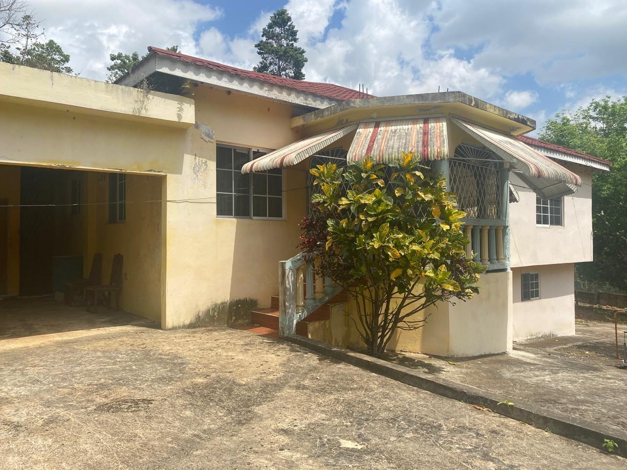 Charming-½-Acre-Home-for-Sale-in-Clarks-Town-Jamaica First image of Clarks Town in Clarks Town, Manchester, Jamaica - property is For Sale