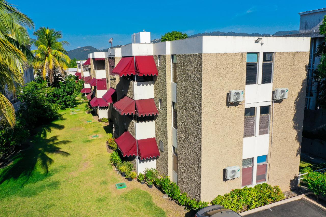 Cozy-2-Bedroom-Apartment-for-Sale-in-St.-Andrew-Jamaica First image of 2-115 Constant Spring Road in Kingston 8, St. Andrew, Jamaica - property is For Sale