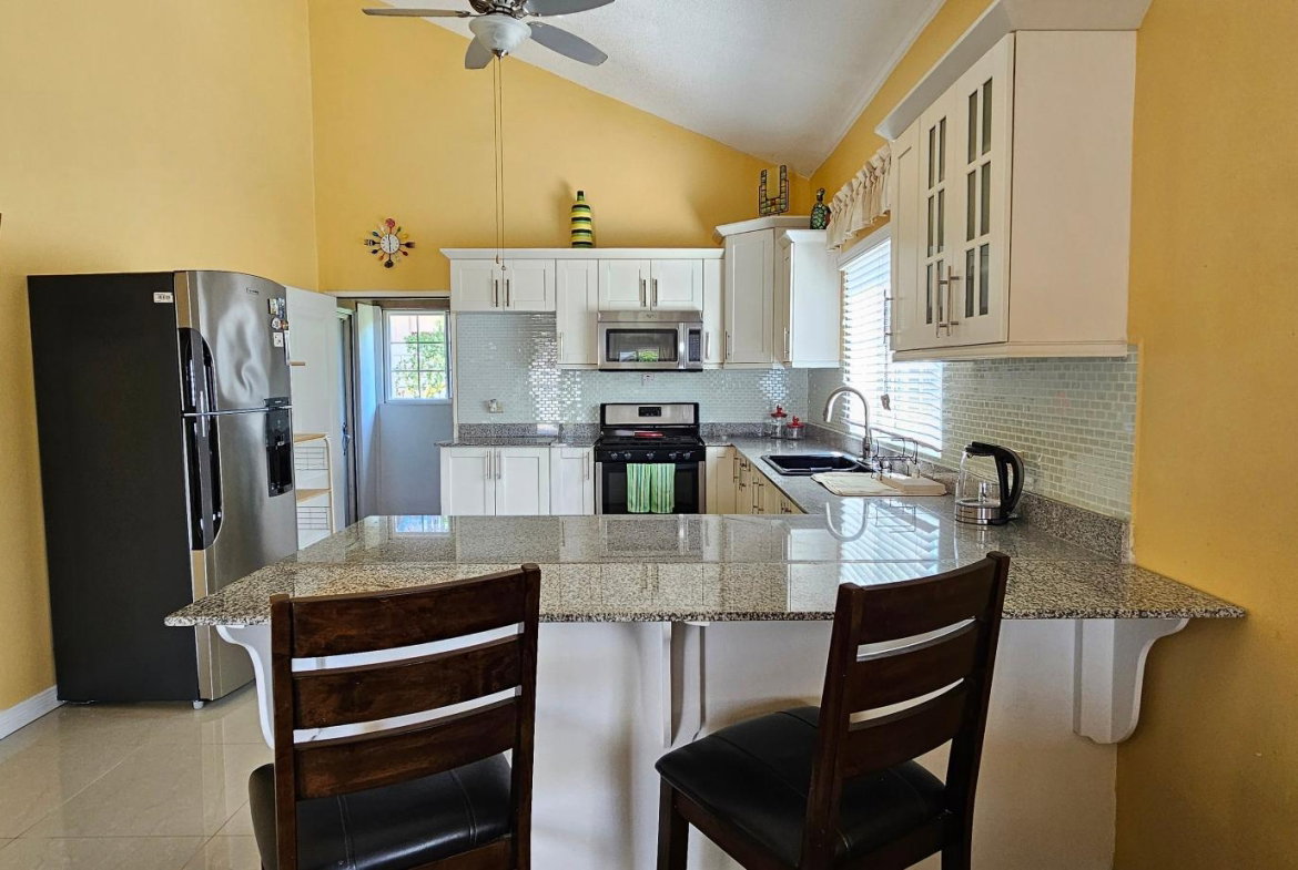 Seventh image of 129 Caymanas Country Club Est in Caymanas Estates, St. Catherine, Jamaica - property is For Rent