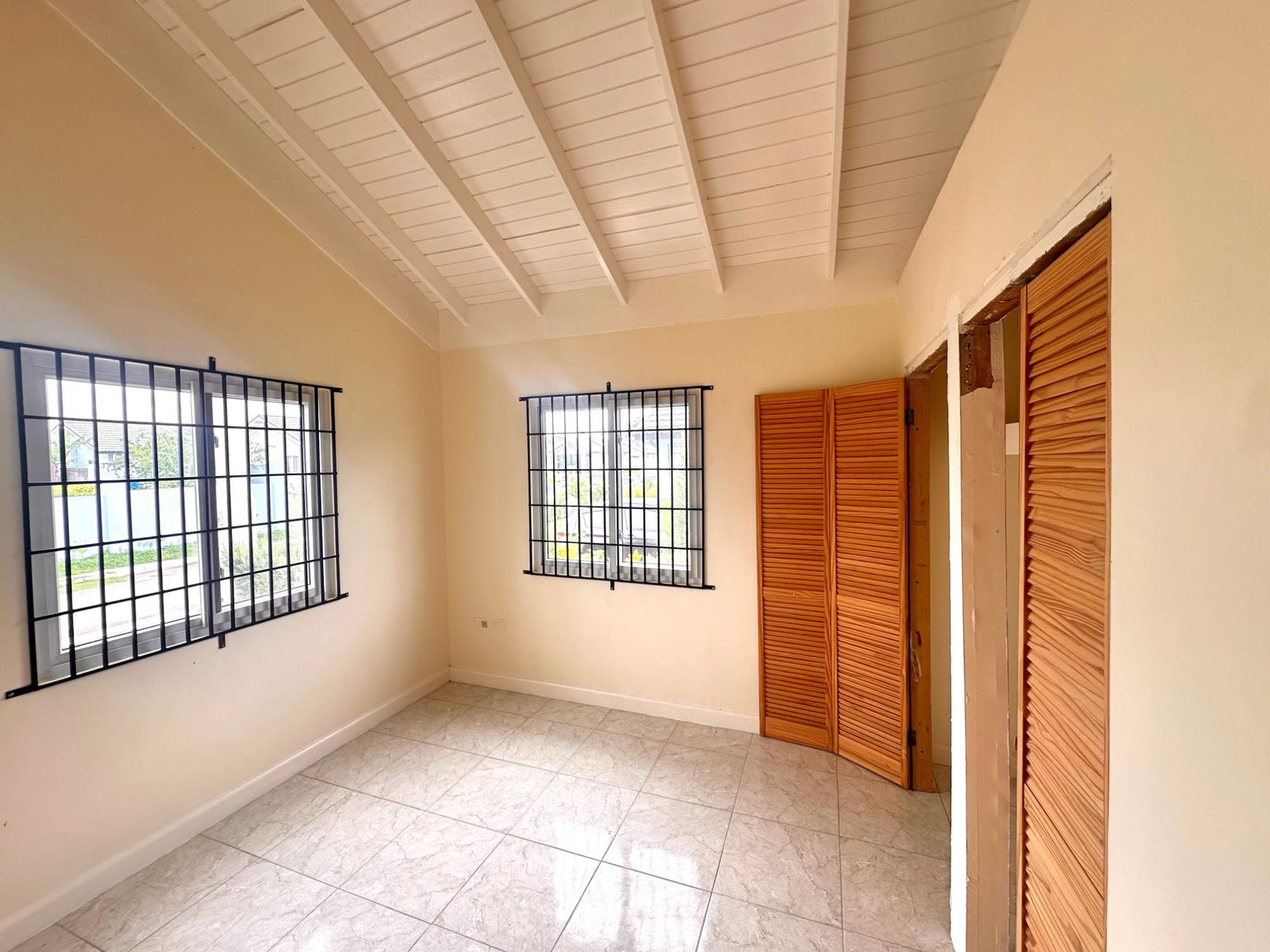 Modern-2-Bedroom-House-for-Sale-in-The-Orchards-St.-Catherine Fifth image of Lot 696 Java Plum Crescent, Phase in Innswood, St. Catherine, Jamaica - property is For Sale