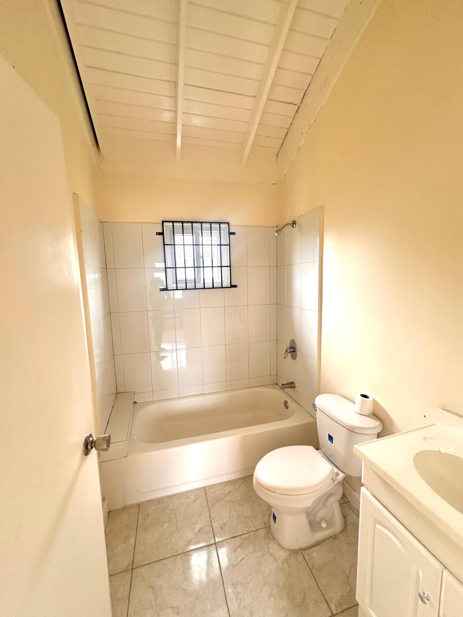 Modern-2-Bedroom-House-for-Sale-in-The-Orchards-St.-Catherine Sixth image of Lot 696 Java Plum Crescent, Phase in Innswood, St. Catherine, Jamaica - property is For Sale