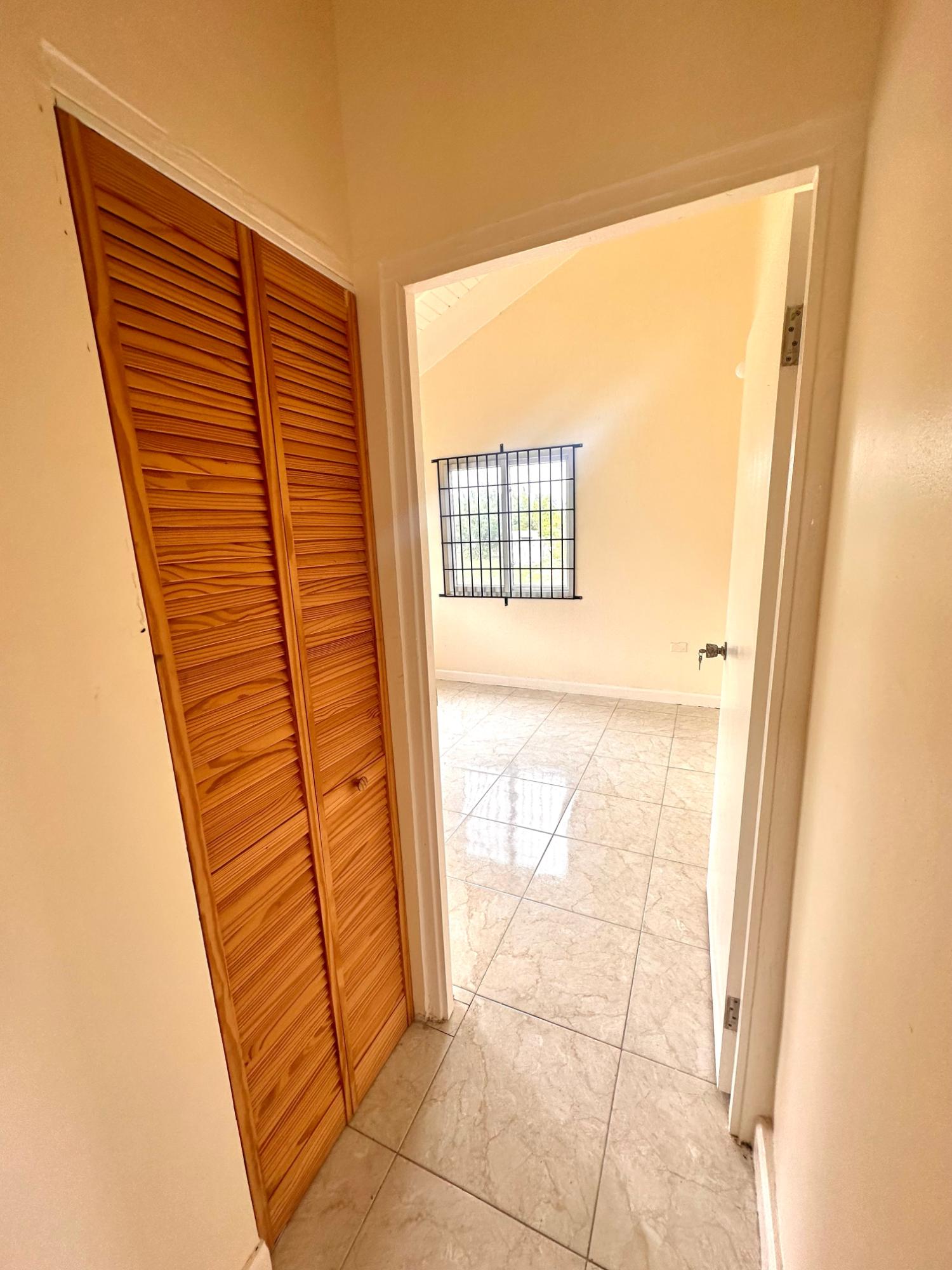 Modern-2-Bedroom-House-for-Sale-in-The-Orchards-St.-Catherine Seventh image of Lot 696 Java Plum Crescent, Phase in Innswood, St. Catherine, Jamaica - property is For Sale