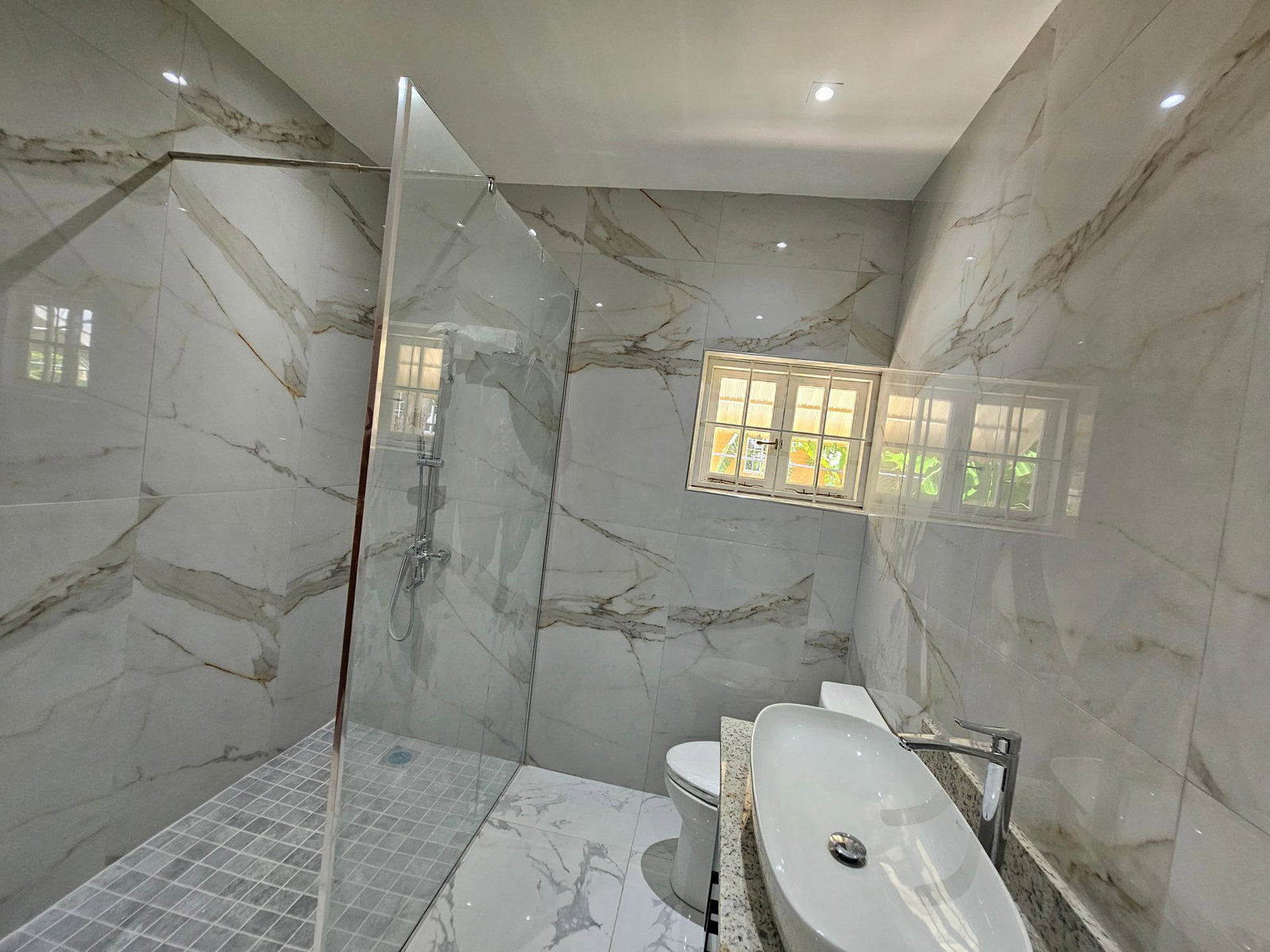 Modern-Semi-Furnished-Super-Studio-Apartment-for-Rent-in-Ironshore-Jamaica First image of 1- Greensview Ave Ironshore in Ironshore, St. James, Jamaica - property is For Rent