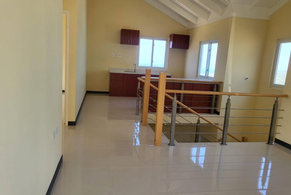 Third image of 126 Edmund Ridge Estate in Rose Hall, St. James, Jamaica - property is For Rent