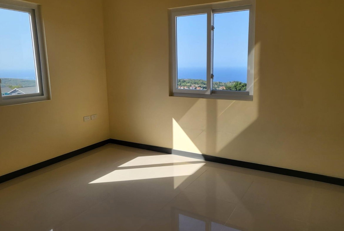Seventh image of 126 Edmund Ridge Estate in Rose Hall, St. James, Jamaica - property is For Rent