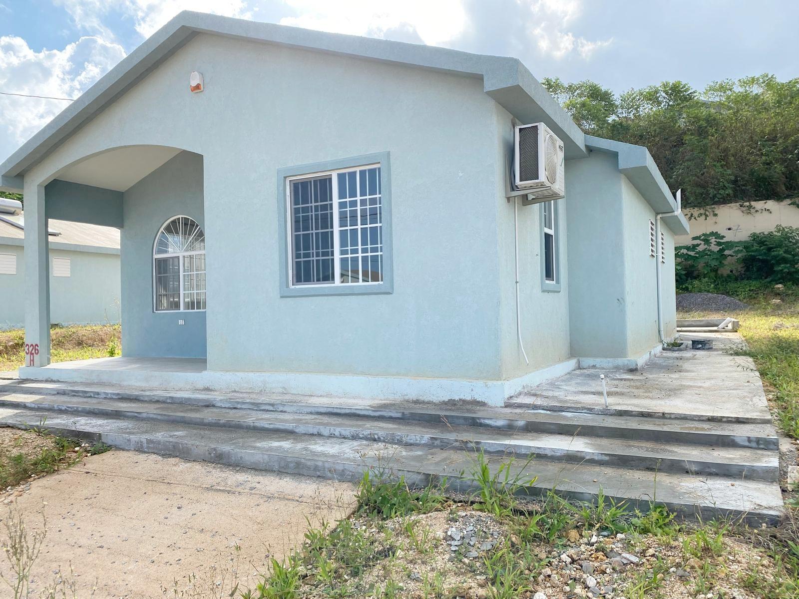 Newly-Built-2-Bedroom-Home-in-Gated-Discovery-Bay-Jamaica First image of 326 Camelot Village, St. Ann in Discovery Bay, St. Ann, Jamaica - property is For Sale