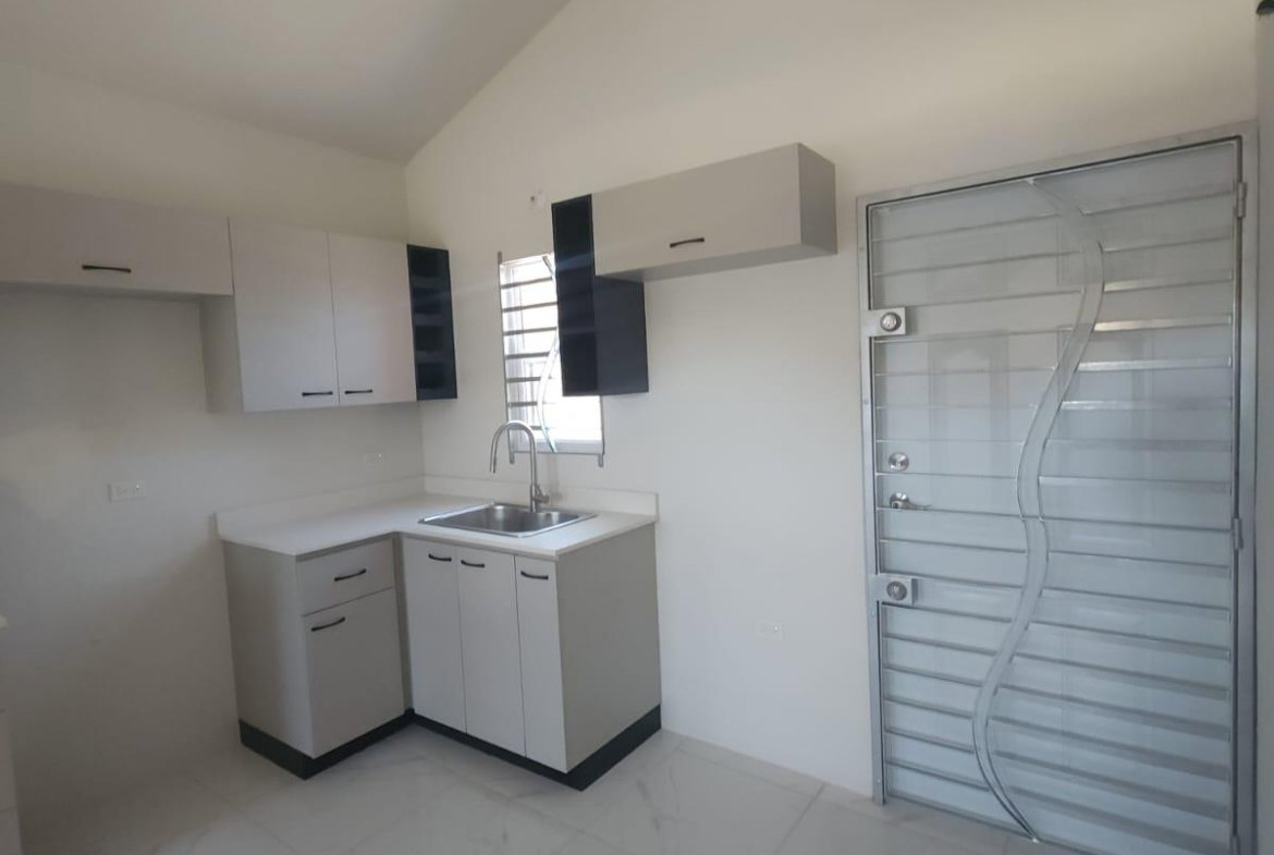 Fifth image of 904 50 Violet Crescent in Phoenix Park, St. Catherine, Jamaica - property is For Rent