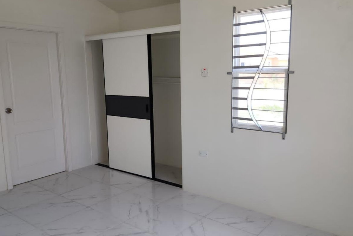 Ninth image of 904 50 Violet Crescent in Phoenix Park, St. Catherine, Jamaica - property is For Rent
