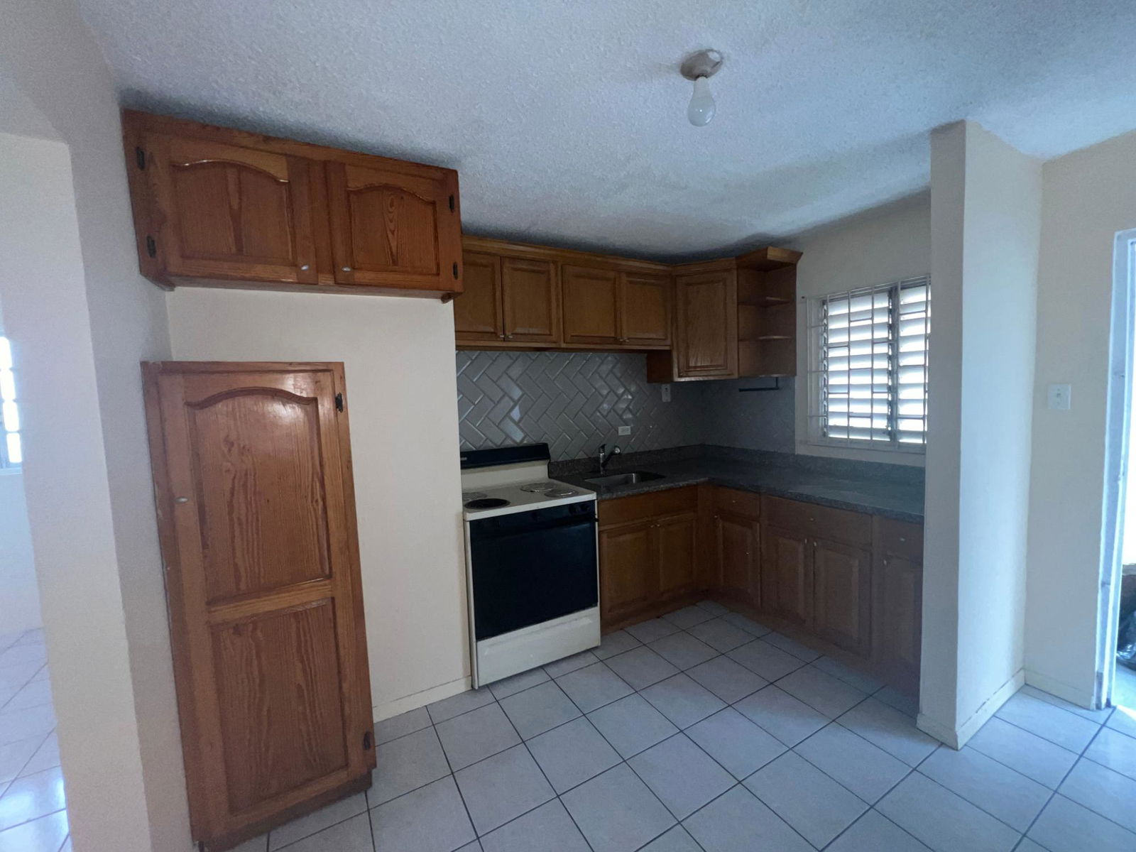 Oaklands-Apartments-for-Sale-in-Kingston-8-Newly-Renovated-Unit Third image of 604-112 Constant Spring Road in CONSTANT SPRING, St. Andrew, Jamaica - property is For Sale