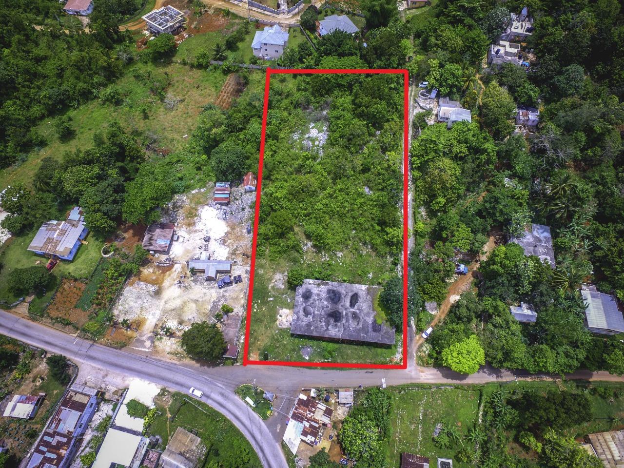 Prime-Commercial-Property-for-Sale-in-Manchester-Jamaica First image of Grey Ground Main Road in Mandeville, Manchester, Jamaica - property is For Sale