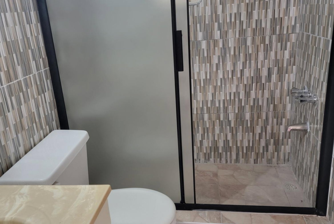 Twenty-Second image of Blocke 305-114 1/2 Constant Spring Rd. in Kingston 8, St. Andrew, Jamaica - property is For Rent