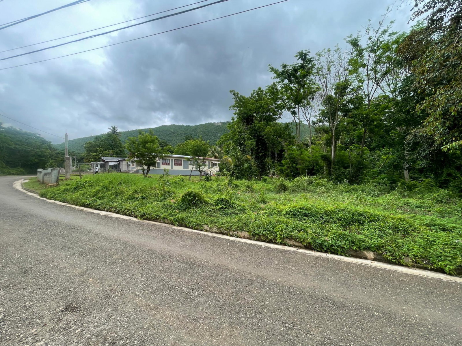 Residential-Lot-for-Sale-in-Porus-Manchester-Spacious-Secure-Community First image of Porus Clarks Town Road in Porus, Manchester, Jamaica - property is For Sale